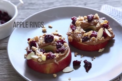 For a nutritious, delicious snack, spread almond butter on apple slices and top with granola and dried Montmorency tart cherries.