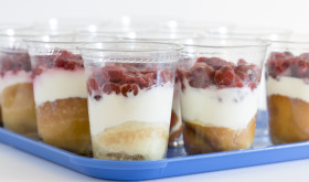 Multiple Pancake Parfaits with Tart Cherries on Lunch Tray