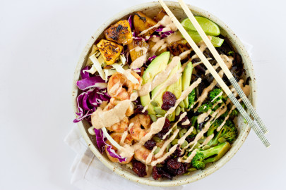 This Tropical Buddha Bowl is infused with island flavor from the Coconut Brown Rice to the Almond Butter Lime dressing. Perfectly grilled shrimp, pineapple, tart cherries, and a bowl full of veggies! It’s great for meal prep.