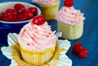 Vanilla Cupcakes with Tart Cherry & Orange Frosting